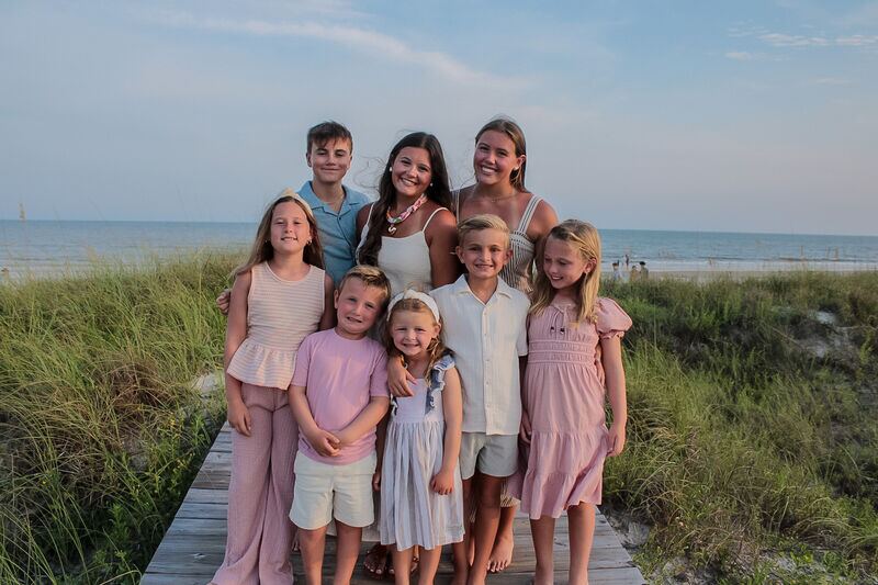 Extended family group portrait near the dunes