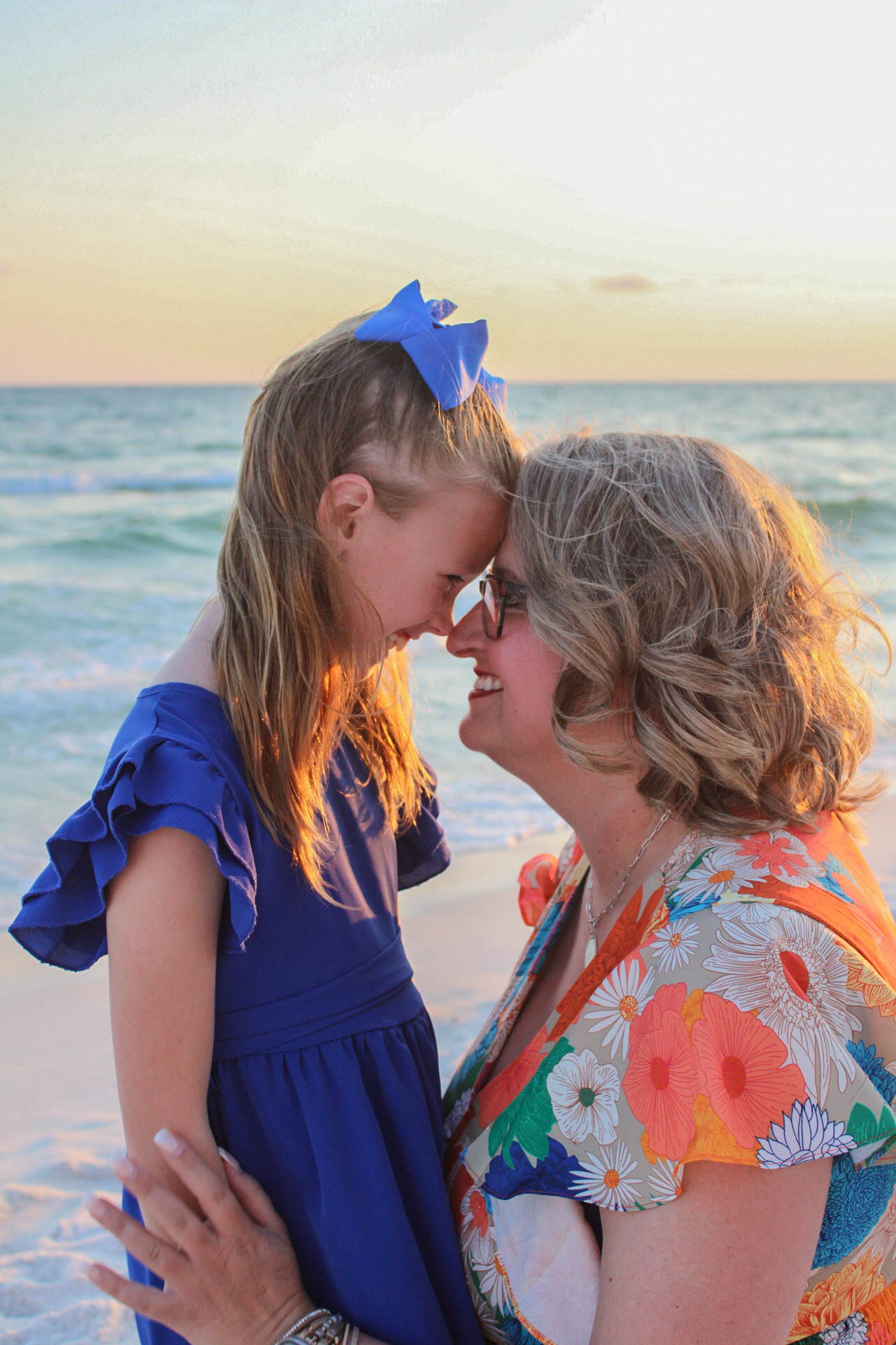 Mother and daughter during a golden-hour Gulf Coast beach session